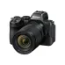 Angled perspective of Nikon NIKKOR Z 24-105mm f/4-7.1 lens mounted on a black Nikon Z camera body