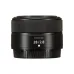 Side view of compact Nikon NIKKOR Z 28mm f/2.8 prime lens showing NIKKOR 28/2.8 model text and control ring