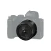 Angled view of compact Nikon NIKKOR Z 28mm f/2.8 prime lens mounted on a mirrorless Nikon Z camera body