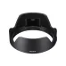 Perspective view of black Sony petal-style lens hood with filter access window and Sony logo