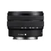 Side profile of Sony FE 28-60mm f/4-5.6 lens showing E-mount marking and focal length indicators
