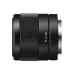Side profile view of compact Sony FE 28mm f/2 lens lying horizontally displaying FE 2/28 model designation
