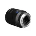 Rear perspective view of Sony Vario-Tessar T* FE 24-70mm f/4 ZA OSS lens showing metal E-mount and blue Zeiss badge