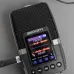 Angled top view of the Zoom H2 Handy Recorder with a color screen lit up while connected via cable.