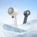Hoco HX612 handheld cooling fans in white and black set against a snowy backdrop emphasizing cooling.