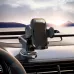 Dashboard installed view of BWOO BO-ZJ125 Dashboard Car Mount Phone Holder holding phone in car interior with road visible ahead