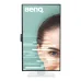 BenQ monitor in portrait mode with slim bezels, displaying eye with UI overlay, ergonomic stand and modern design