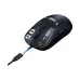 The Onikuma DM05 black gaming mouse, shown in an angled perspective with a blue-and-black USB-C charging cable partially plugged into the front.