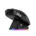 Side view of the black Onikuma DM07 gaming mouse docked on its RGB magnetic charging stand.