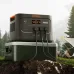 Outdoor camping view of the Jackery Explorer 3000 v2 3600W Portable Power Station powering devices from a cooler.