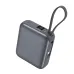 Compact square gray power bank featuring a digital battery display, power button, USB-C port, and an integrated gray carrying loop.