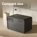 Front view of compact Deli VS4529-BK Digital Safe with keypad and dial placed on desk beside cabinet and pen holder.