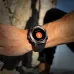 HONOR CHOICE Watch 2 Epic on wrist with black strap showing rock climbing mode and flame icon.