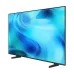 Side angled view of Samsung 85U8500H 85 inch Crystal 4K UHD LED Smart TV showing thin frame and stand design