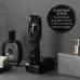 Charging stand view of Panasonic ER-GB42-K Trimmer with compact dock beside grooming accessories in bathroom setup.