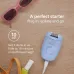 Promotional view of Philips BRE228/00 Epilator with light blue body placed beside accessories, highlighting quick 10-min use.