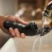 Feature view of Philips X3021/00 Shaver rinsed under running water, showcasing waterproof design for easy cleaning.