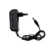 Side profile view of the PC Power 12V 2A Mini UPS Power Adapter showing its plug prongs and output cable.